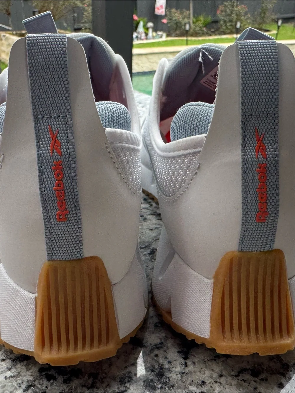 Reebok White and Gray Trail Runner with Orange Logo Accent